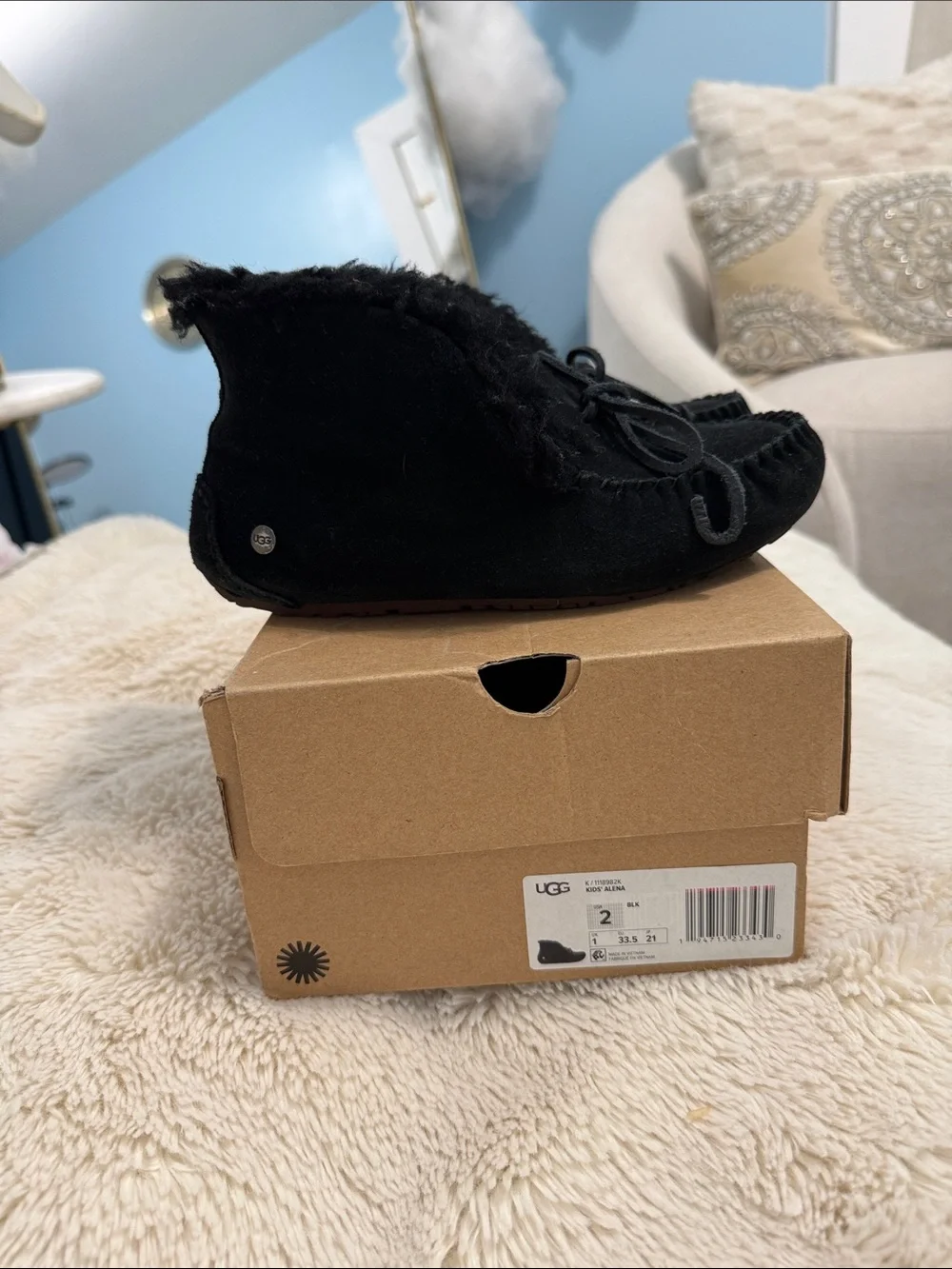 UGG Kids Black Suede Moccasin Slippers with Bow Accent